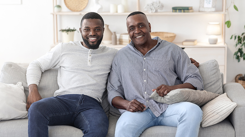 Father Son Sofa Family Adobestock 366259775